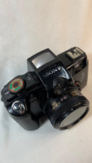 Câmera Fotográfica Analógica
 Sony Analógica Motor Drive com HandGrip e Flash