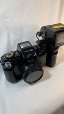 Câmera Fotográfica Analógica
 Sony Analógica Motor Drive com HandGrip e Flash